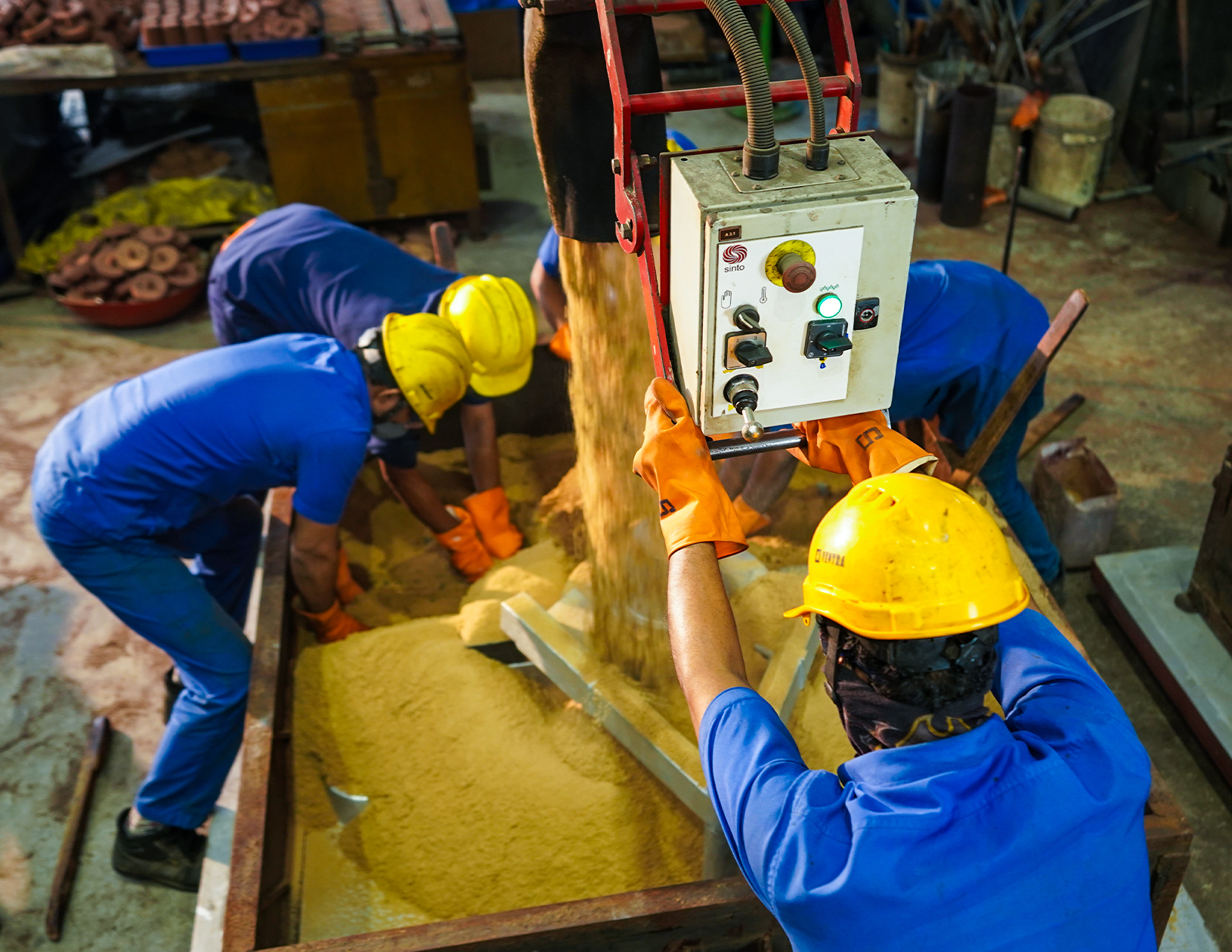 Molten alloys being poured in foundry